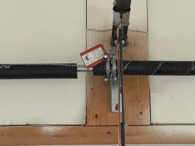 Garage door spring close up.