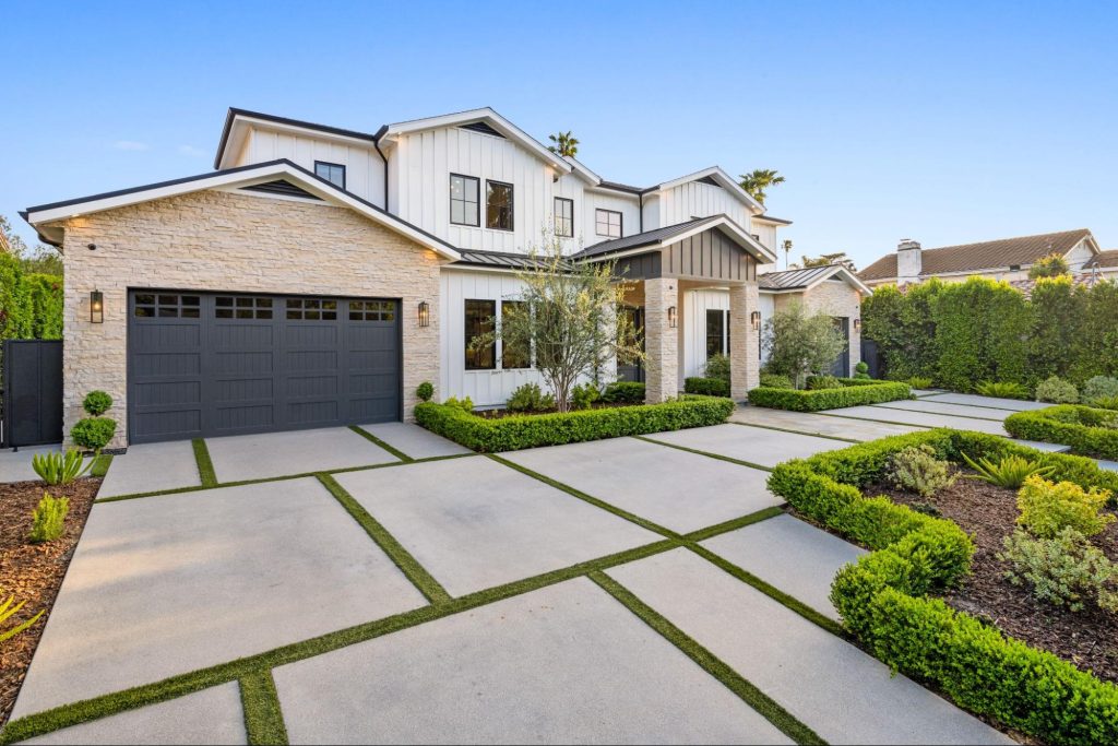 Modern home with a garage door.