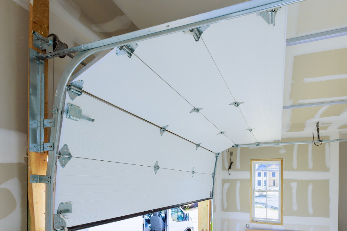 Seasonal Tips for Preventive Garage Door Service and Repair